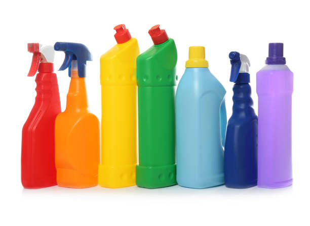 istock Bottles of different cleaning products on white background 1367842675