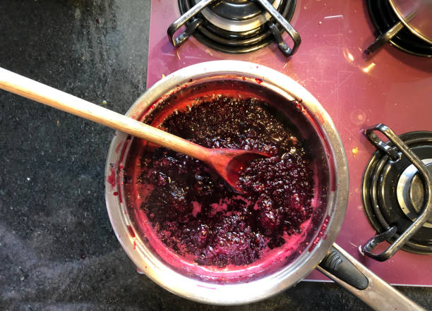 making blackberry jam at home. - fruit sauce imagens e fotografias de stock
