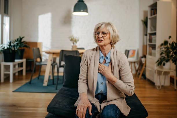 istock Senior woman has chest pain 1367842729