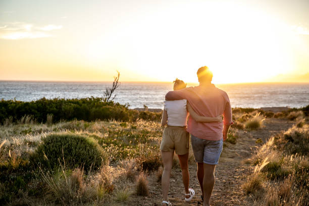 istock Young couple walking in nature. 1367842796