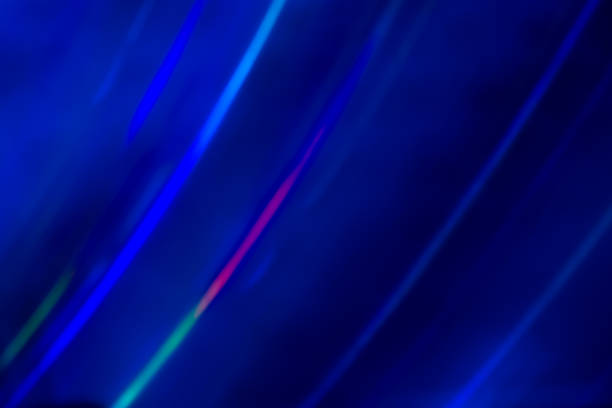 Blue rainbow abstract background from the sun shines on the silicon wafer.