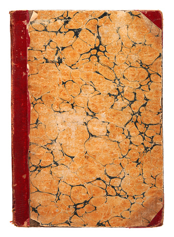Old book journal cover, with worn marbled paper pattern, scuffed leather spine and corner