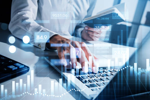 istock Businessman is analyzing stock market behavior and making calculations 1367848691