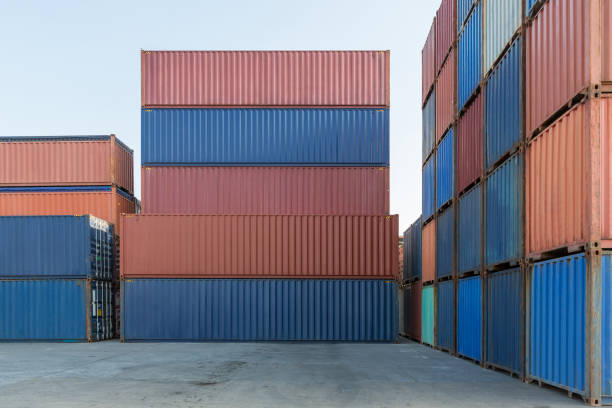 stack of containers in a harbor. shipping containers stacked on cargo ship. background of stack of containers at a port. - 16191 imagens e fotografias de stock