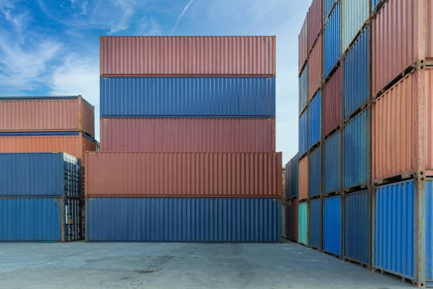 stack of containers in a harbor. shipping containers stacked on cargo ship. background of stack of containers at a port. - 16191 imagens e fotografias de stock