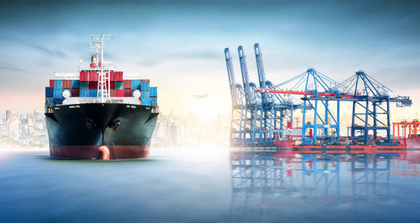 istock Global business logistics import export of containers cargo freight ship during loading at industrial port by crane and cargo plane on city background, transportation industry concept 1367855637