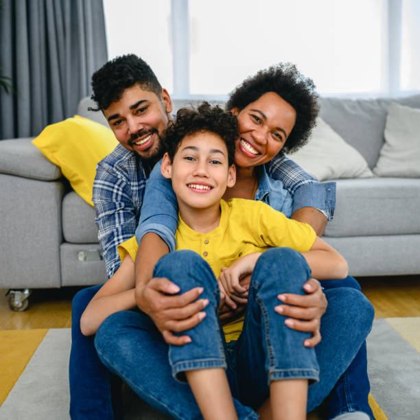 istock Happy black family at home. 1367857755
