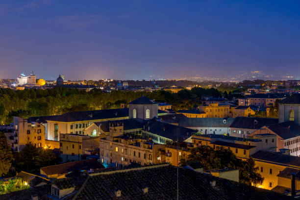 istock Roman citscape panorama at dusk, Rome Italy 1367858489
