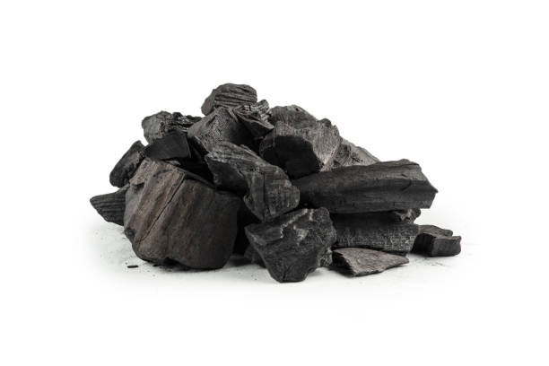 istock Black oak coal isolated on white background. 1367861825