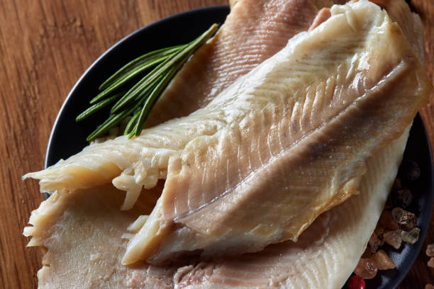 istock Smoked trout fish with herbs 1367862692