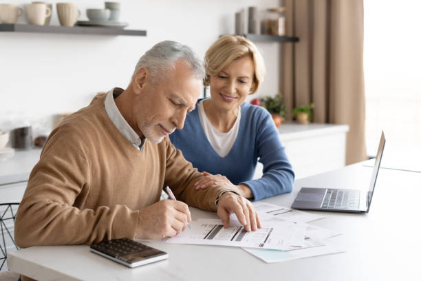 istock Inspirated retired couple dealing with utility bills payment 1367863169