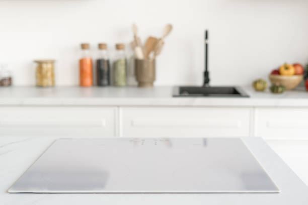 istock Induction cooker in modern white tones kitchen 1367863891