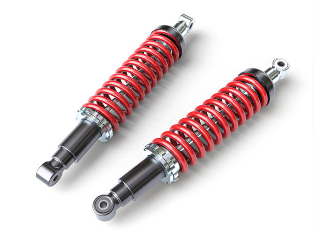 istock red car shock absorbers on the white background. 1367865898