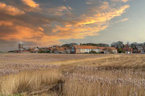 The windmill and marshes at Cley Next the Sea in North Norfolk, UK at dawn