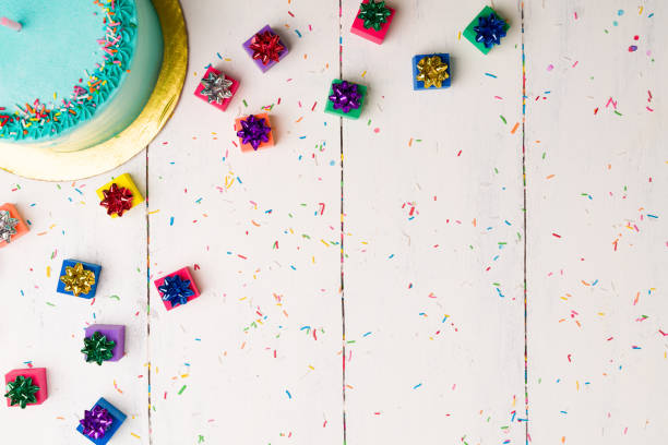istock Wooden table with birthday presents 1367867457