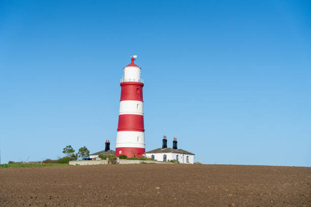 istock Happisburgh lighthouse in Norfolk, UK 1367867510
