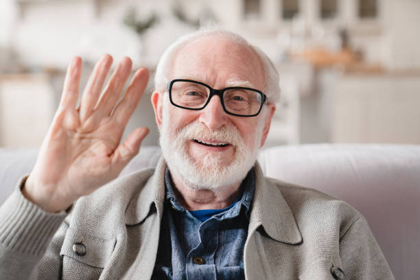 istock Front view. Videocall conference conversation online. Caucasian old elderly senior man grandfather looking at camera, talking with friends, grandchildren, social distance concept 1367871221