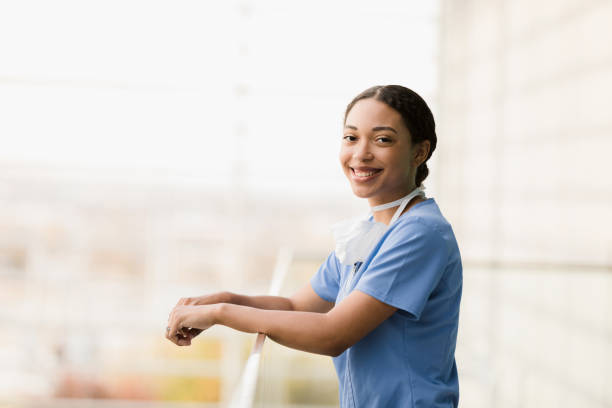 istock Female intern smiles for camera 1367871768