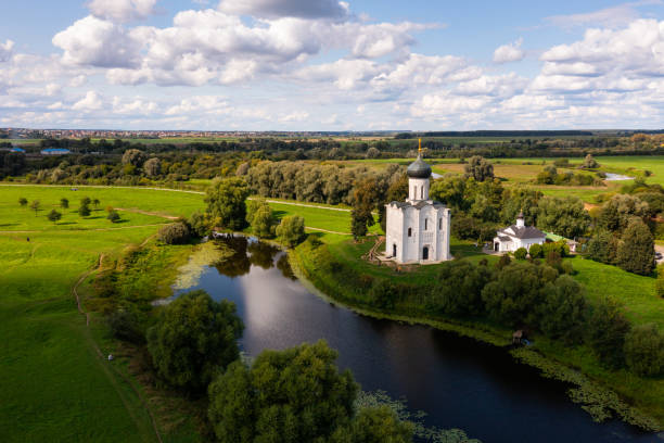 Orthodox Church of Intercession on River Nerl, Russia Aerial drone view of medieval Church of Intercession on the Nerl in summer, Russia vladimir russia stock pictures, royalty-free photos & images