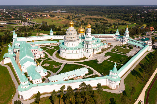 View from drone of impressive architectural complex of New Jerusalem Monastery in ancient Russian town of Istra in Moscow Oblast on summer day