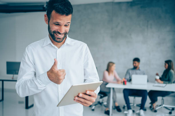 istock Businessman having video call in the office. 1367874031