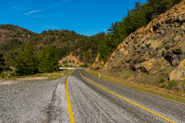 istock Turning the mountain road 1367874385