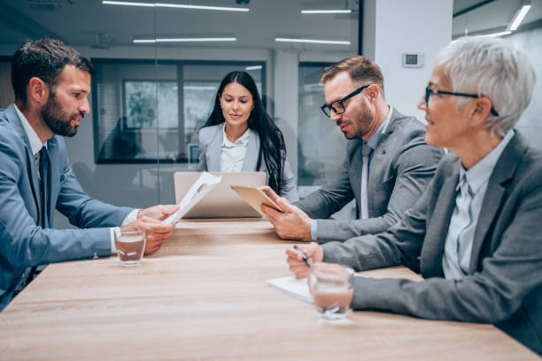 istock Business persons on meeting in the office. 1367874493