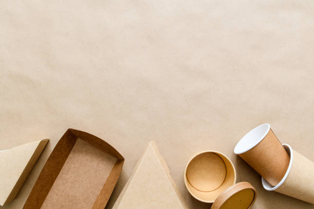 istock Lots of different eco friendly disposable from the bottom of the frame (pizza container, paper cups). 1367875475