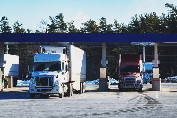 istock Semi Trucks at Gas Station 1367877546