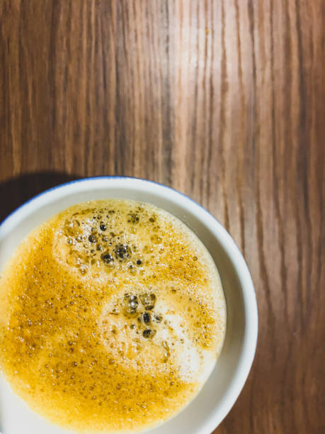 istock Freshly made coffee on a dark wood as a background. 1367878517