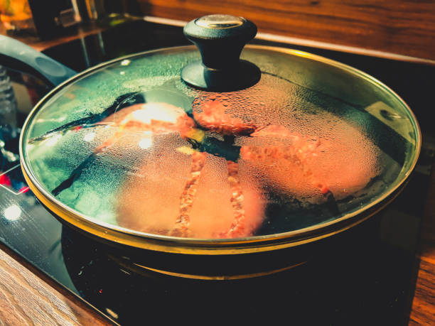 Burger meat on frying in a pan.