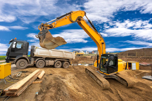 istock excavator working on construction site in front of dramatic sky 1367881658