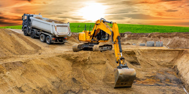 istock excavator working on construction site in front of dramatic sky 1367881702