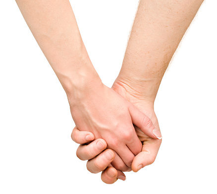 male and female hand holding hands on a white isolated background