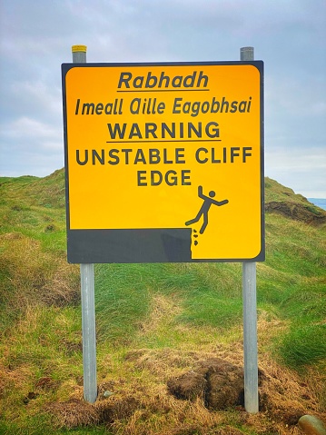 Cliff edge warning sign on the Wild Atlantic Way Ireland