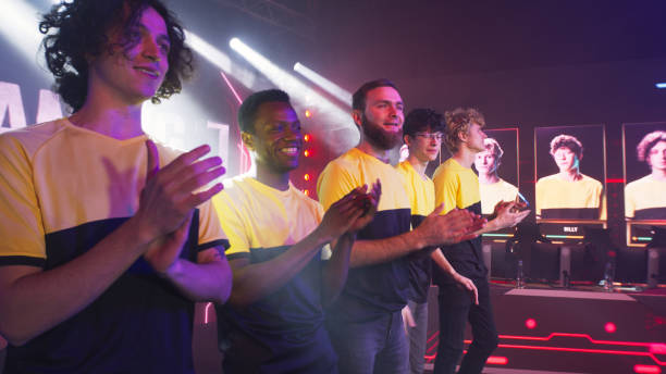 istock Diverse cyber sportsmen greeting audience 1367884261