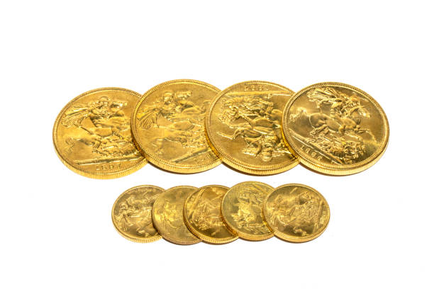 istock Gold Sovereign Coins Bullion on a White Background 1367888644