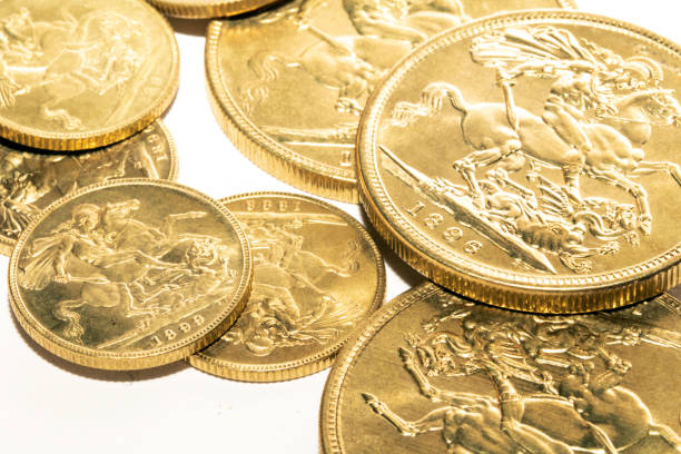 istock Gold Sovereign Coins Bullion on a White Background 1367888822