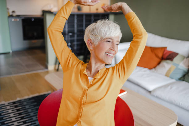 istock Hands behind head and relaxing at home 1367889559
