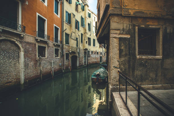 istock a small canal in venice 1367890394