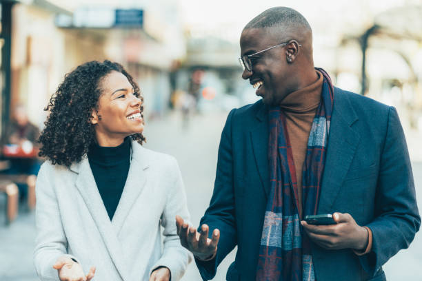 istock Happy young couple outdoors 1367891725