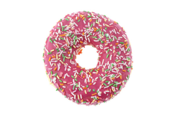 istock Donut close-up on a white background. Round donut isolated on white background. 1367892085
