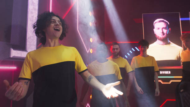 istock Happy diverse gamers greeting audience 1367892233