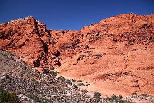 The Red Rock mountains with the peaks on the clear blue sky in the Canyon in Nevada