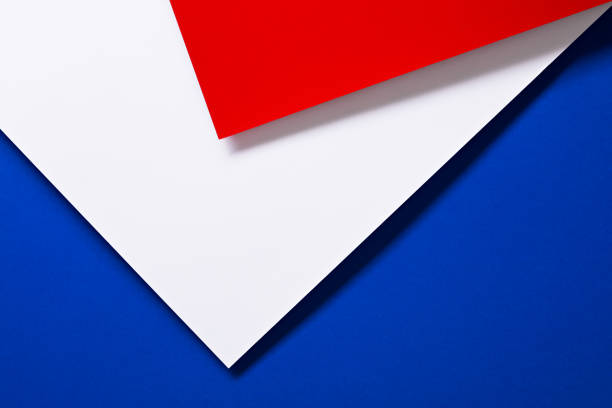 Red, white and blue paper with its texture. Abstract geometric background.