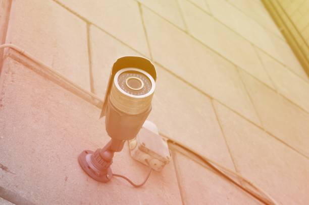 istock CCTV camera security system of the building. Watching what's happening outside. Selective focus 1367898609