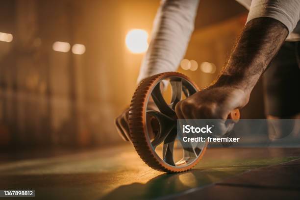 Exercise With Ab Roller Stock Photo - Download Image Now - Abdominal Toning Wheel, Males, Wheel