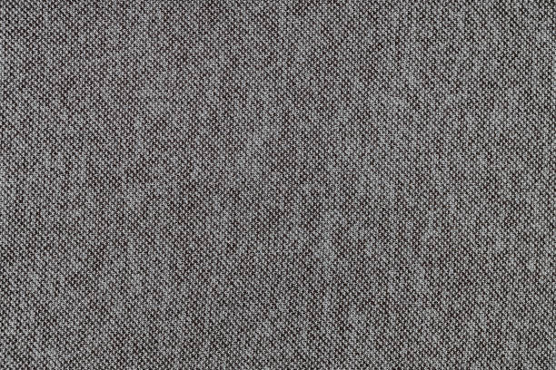 istock Dark gray linen fabric texture close up 1367899072