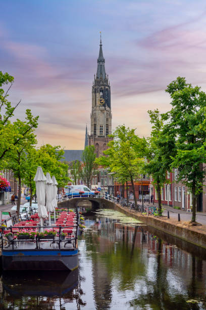Delft canals and New church tower, Netherlands stock photo