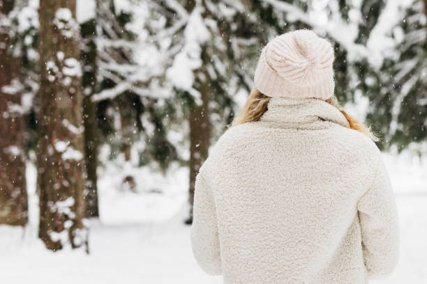 istock A girl in the winter forest 1367903624